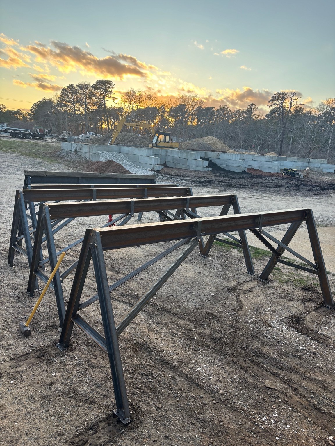 Large structural steel fabrication frames on a job site