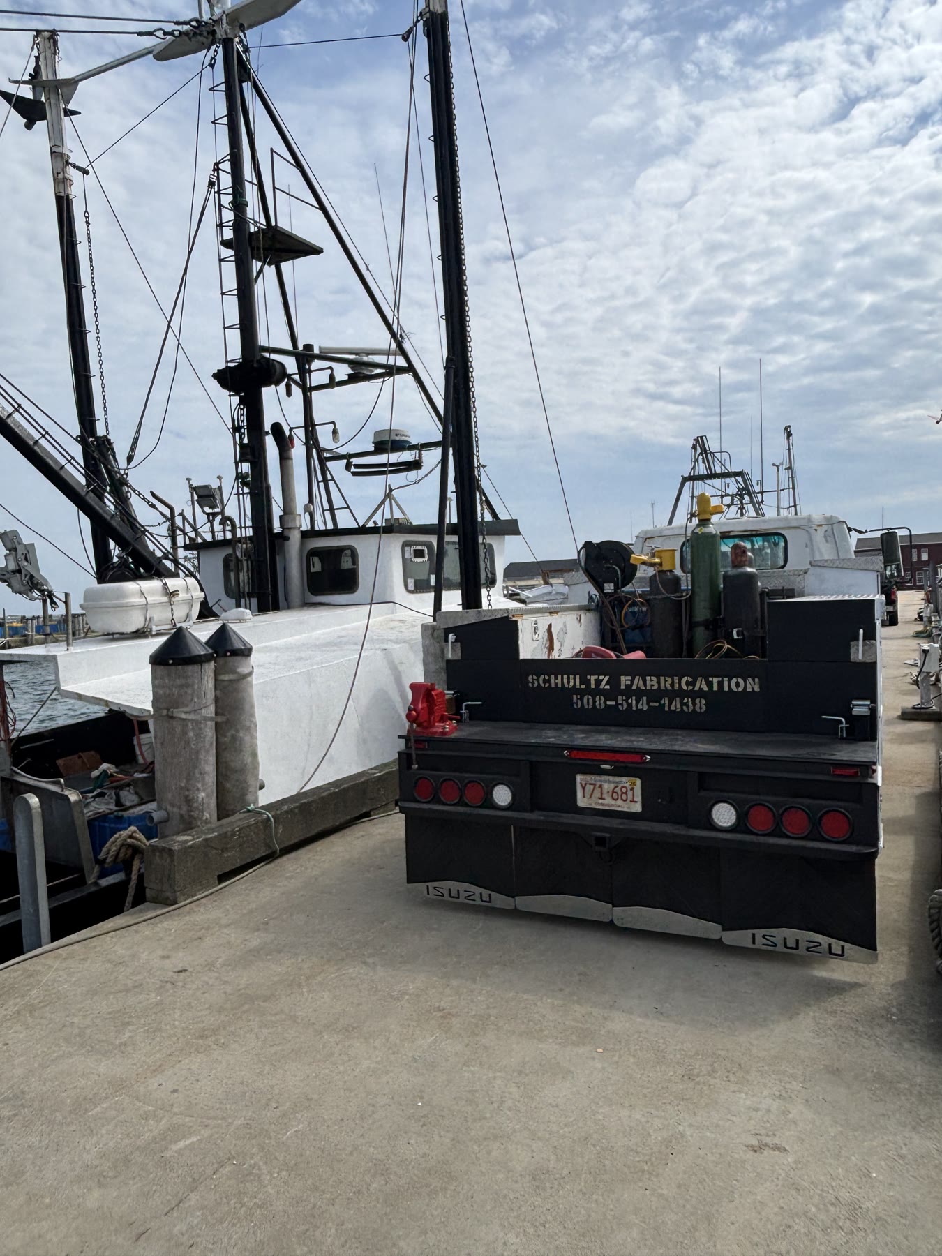 Schultz Fabrication mobile welding truck beside a fishing vessel on Cape Cod